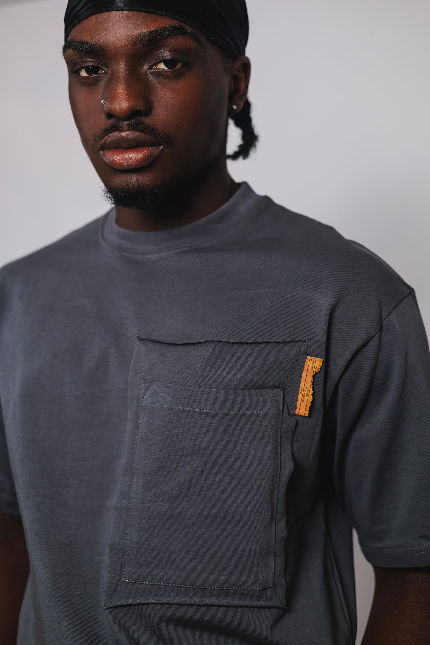 Old Eagle Relaxed Utility Pocket Tee in Charcoal Grey