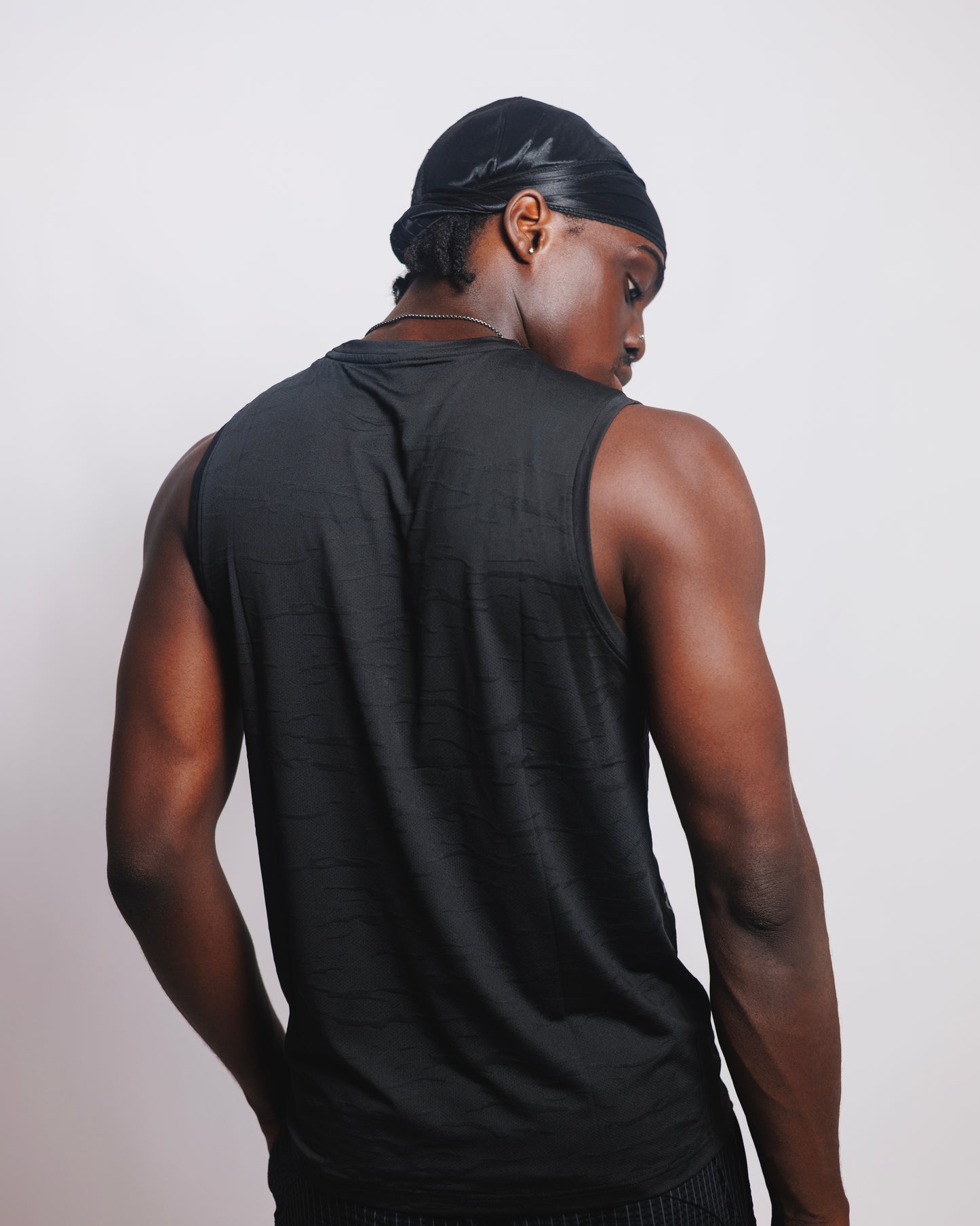 OOD Activ Anywhere Muscle Tank in Jet Black