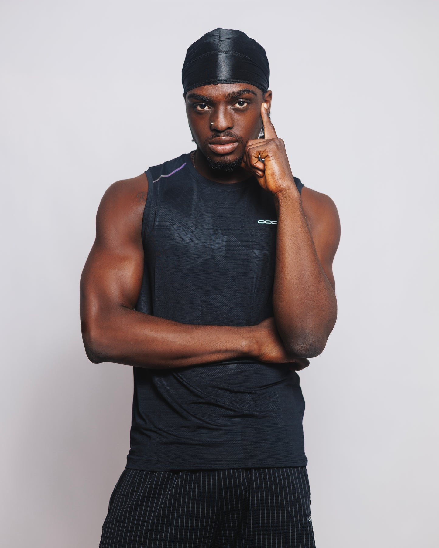 OOD Activ Core Muscle Tank in Jet Black